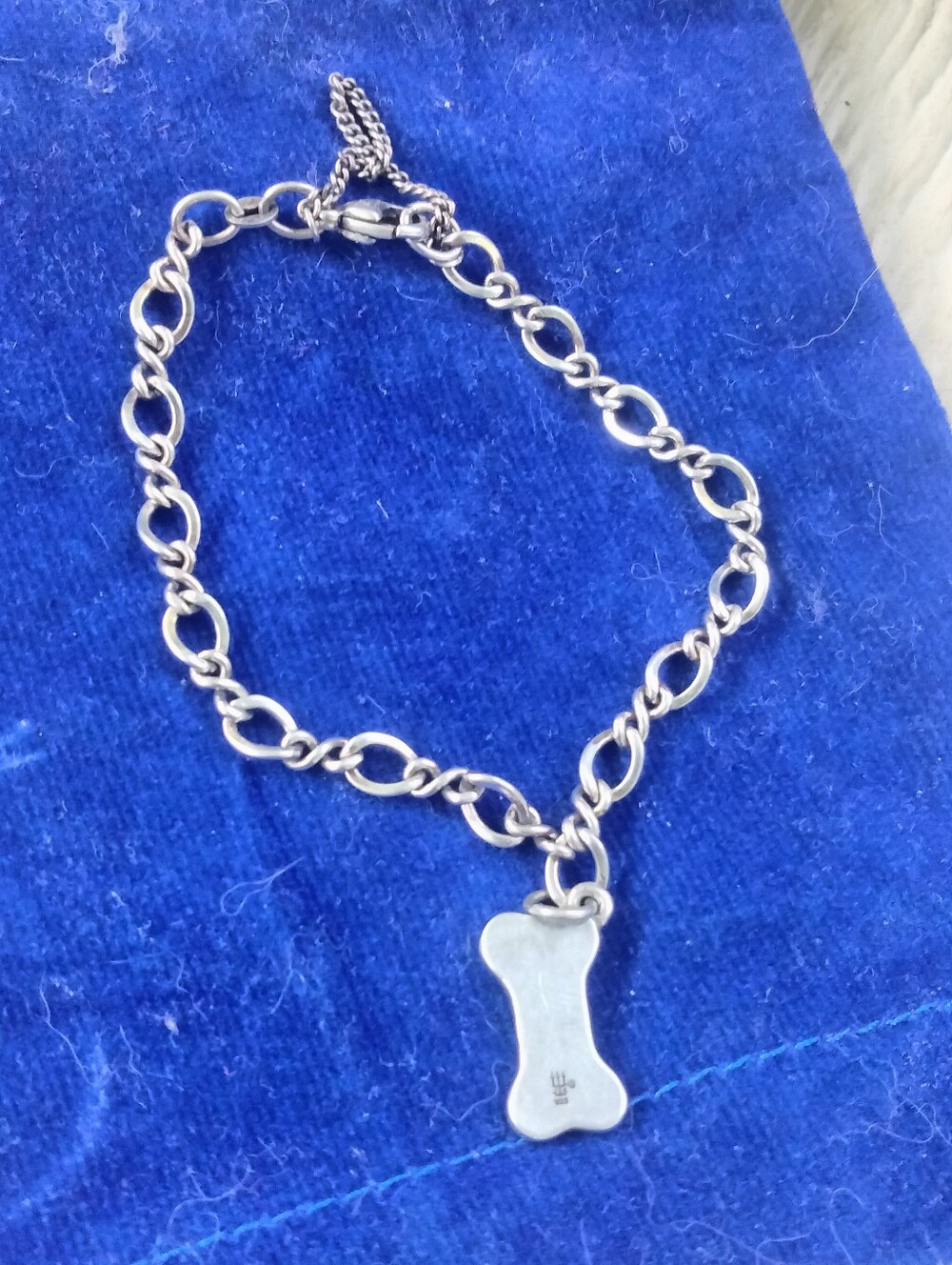 Bracelet with dog bone charm 3 1/2